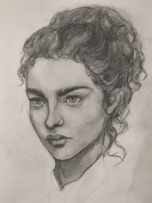 Graphite portrait sketch of a young woman in three-quarter view, looking slightly to the left. She has thick eyebrows, calm eyes, and full lips, with strong shading under the cheekbone and neck. Her curly hair is tied back with loose strands on the side.
