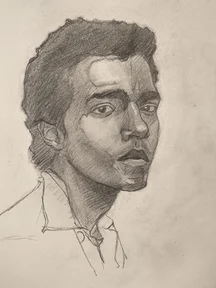 Pencil portrait sketch of a young man in 3/4 view, looking slightly to the right. He has short curly hair, strong cheekbones, and full lips. The face is shaded with soft graphite tones and crosshatching, and there is a loose outline of a shirt collar.